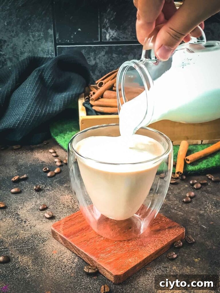 Garnish your cinnamon dolce latte with frothed milk foam.