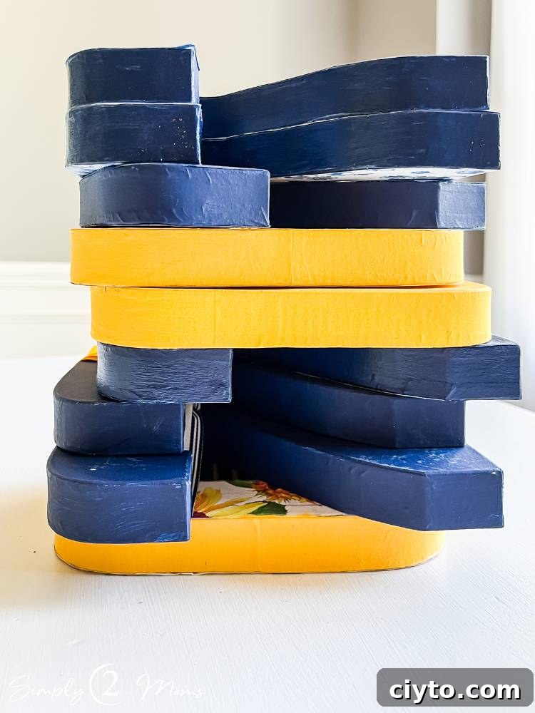 stack of numbers painted blue and yellow on table