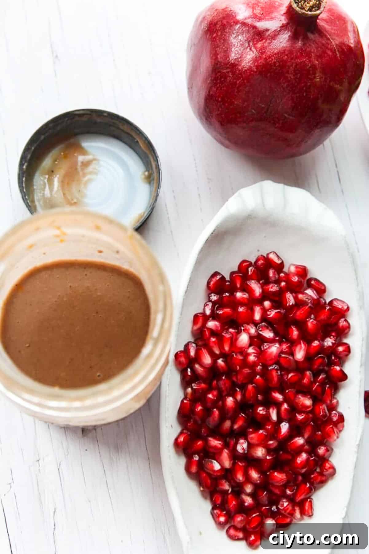 Making pomegranate Mason jar dressing