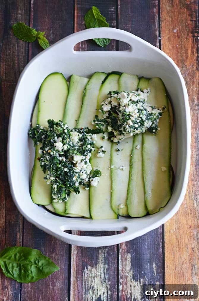 Mediterranean Vegetable Lasagna- With eggplant, zucchini, and spinach, this no-noodle lasagna is sure to become a flavorful favorite! | hostthetoast.com