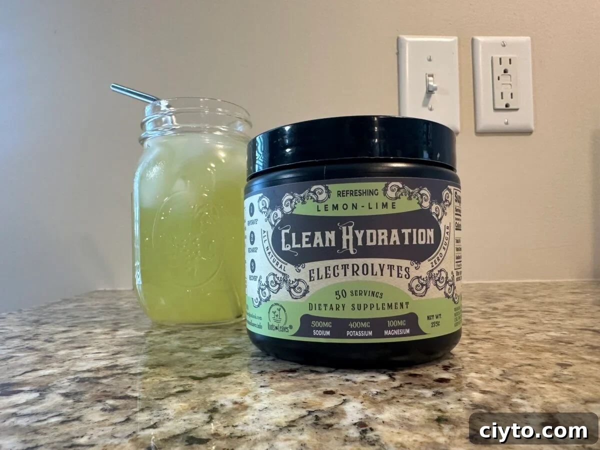 The photo shows a bottle of black-bottled "Clean Hydration Electrolytes" in Lemon-Lime flavor next to a mason jar filled with a matching yellow-green iced drink, both resting on a speckled countertop near a white light switch and outlet plate.