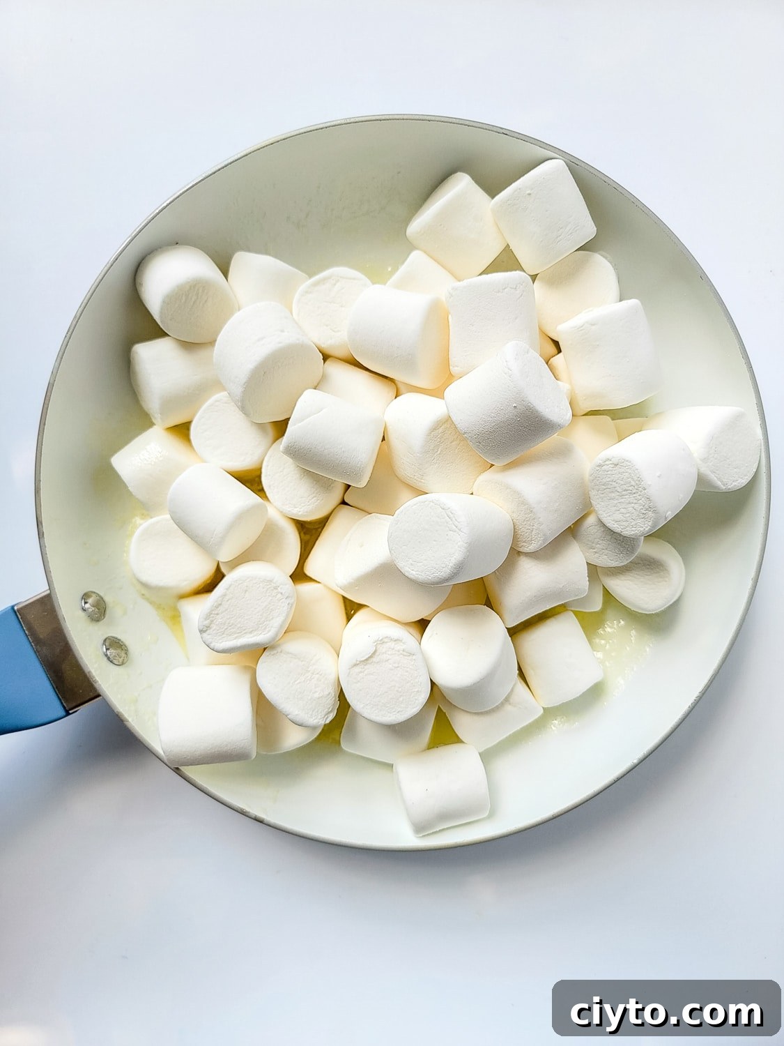 melted butter and jumbo marshmallows in a skillet