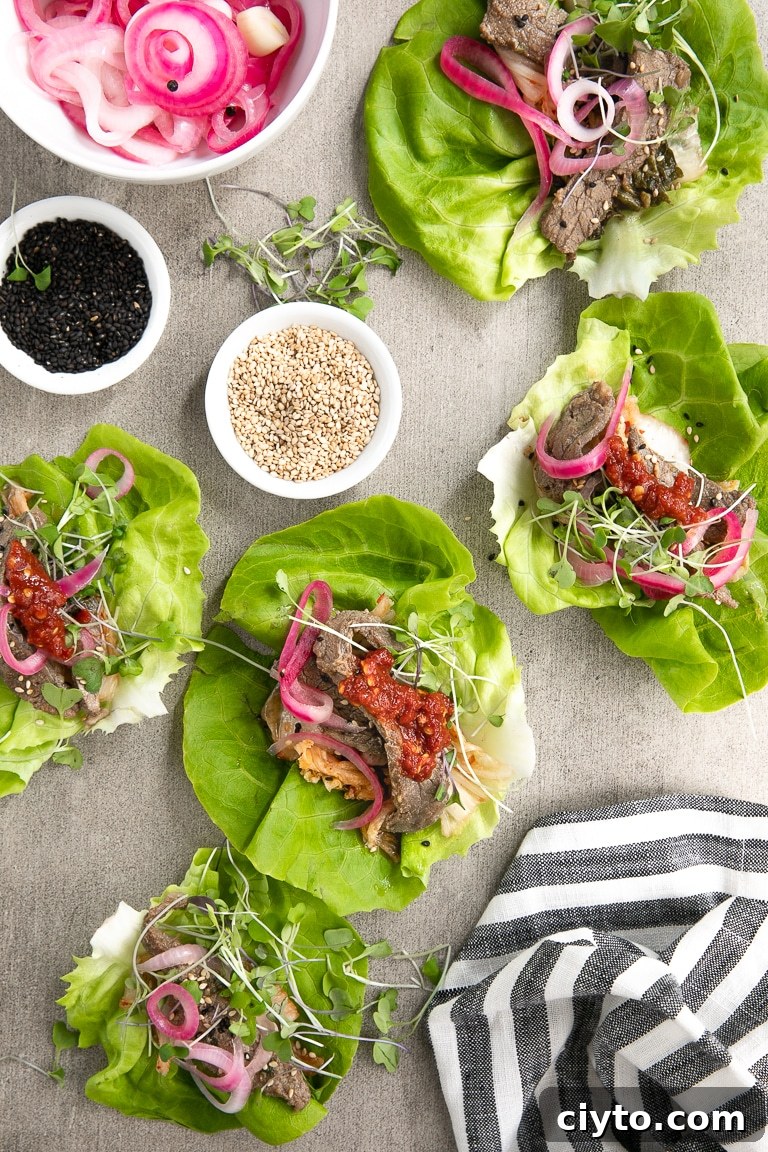 How to Make Korean Bulgogi Beef Lettuce Wraps 5 Korean BBQ Beef served with kimchi, pickled red onions, butter lettuce and micro greens