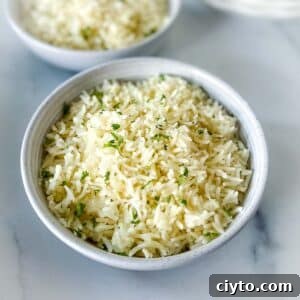 a white bowl of Instant Pot coconut rice.