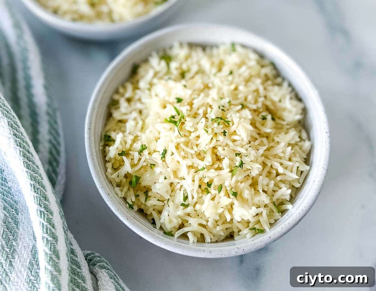 a white bowl with coconut Jasmine rice.