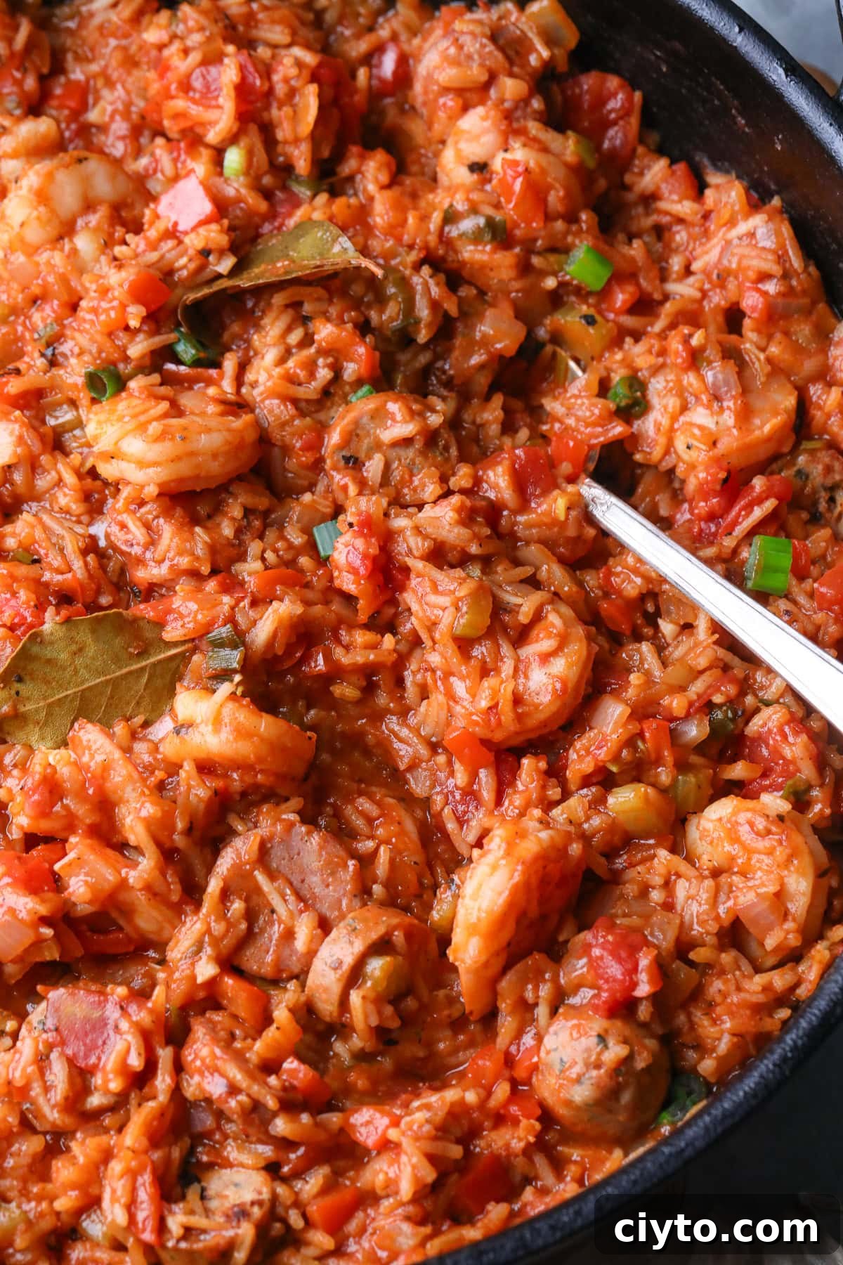 One-Pot Shrimp and Sausage Jambalaya Recipe 8 Close-up photo of shrimp and sausage jambalaya in a skillet.