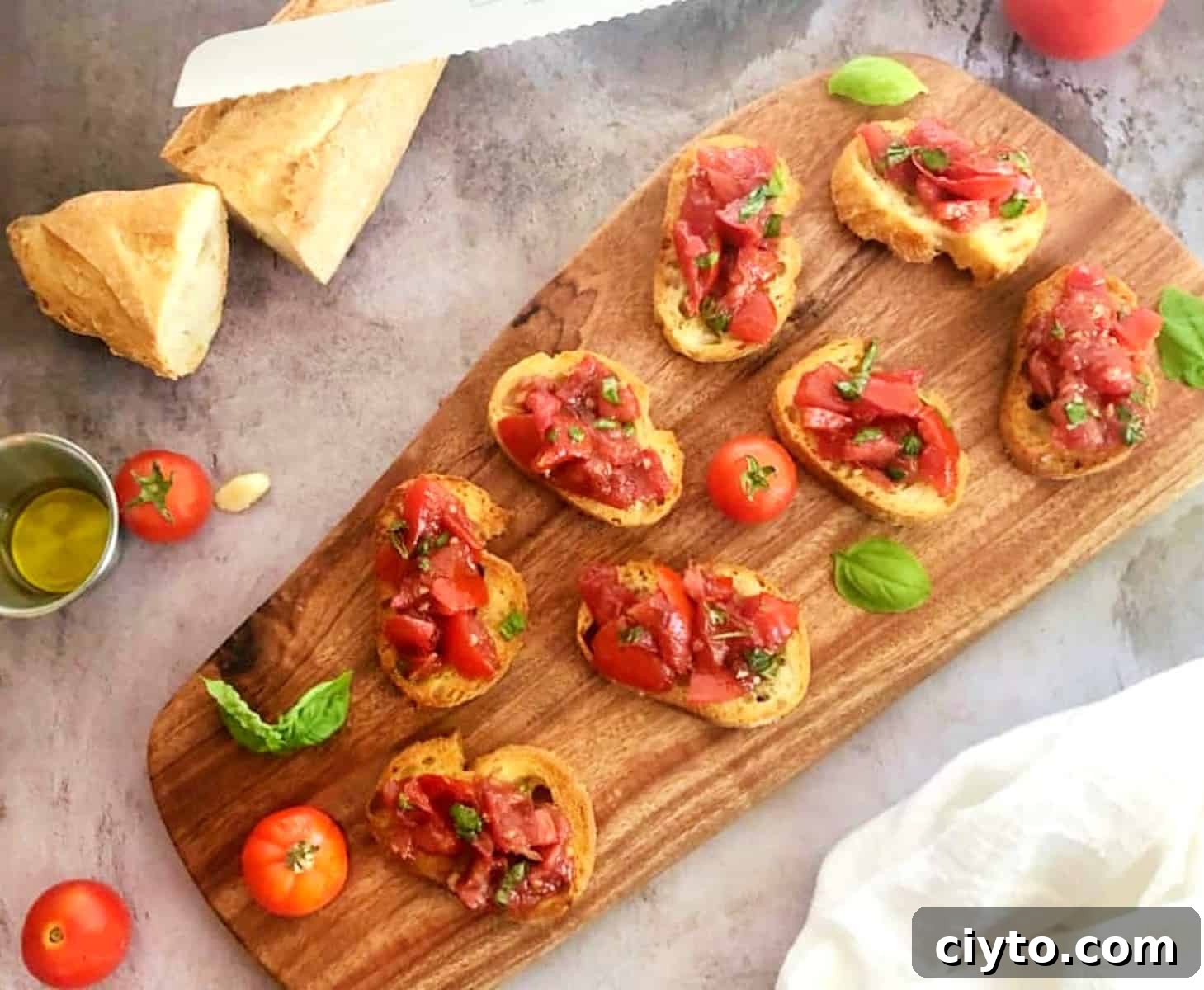 air fryer bruschetta on a cutting board.