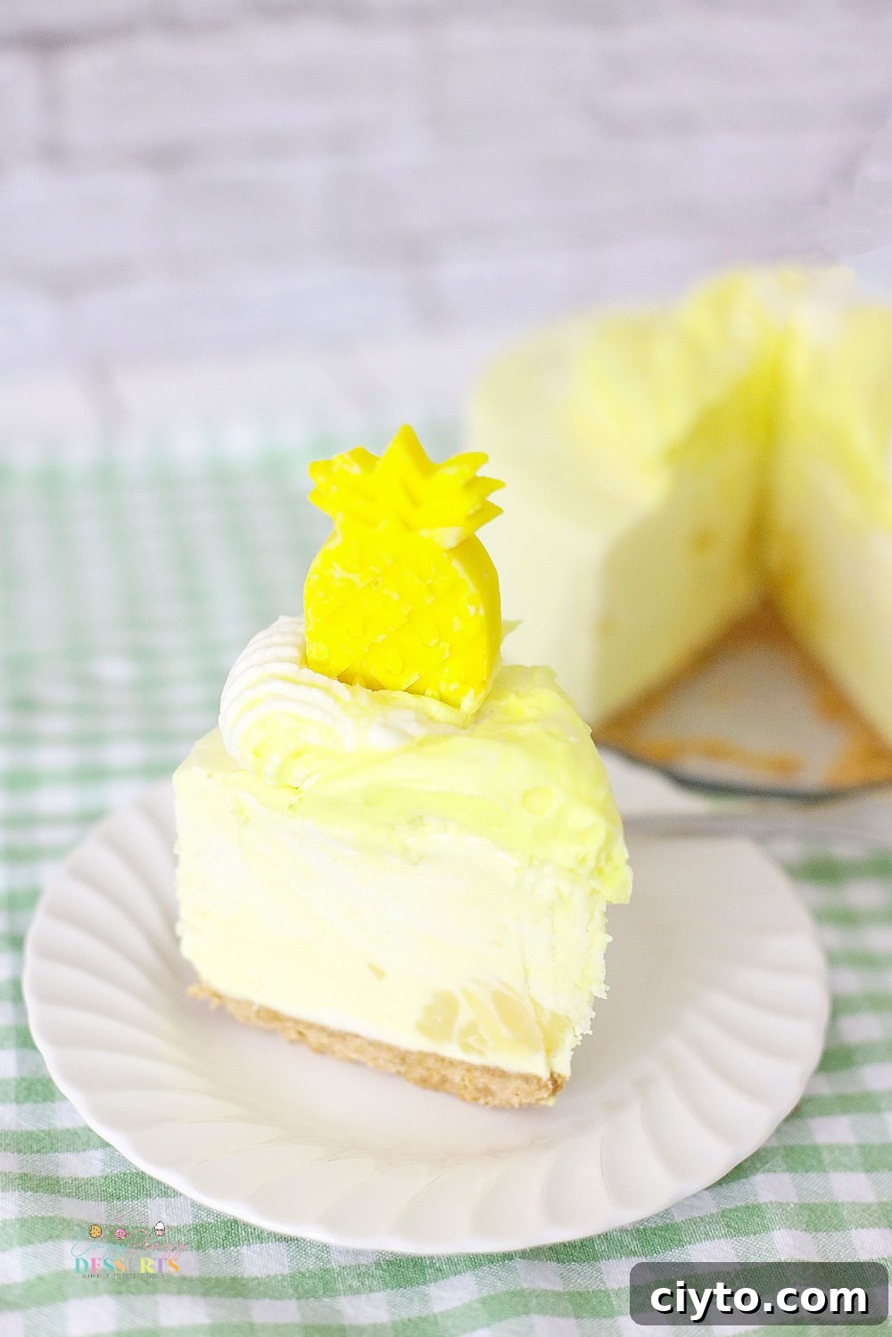 Creamy Pineapple Whip Cheesecake Recipe 5 A slice of pineapple whip cheesecake