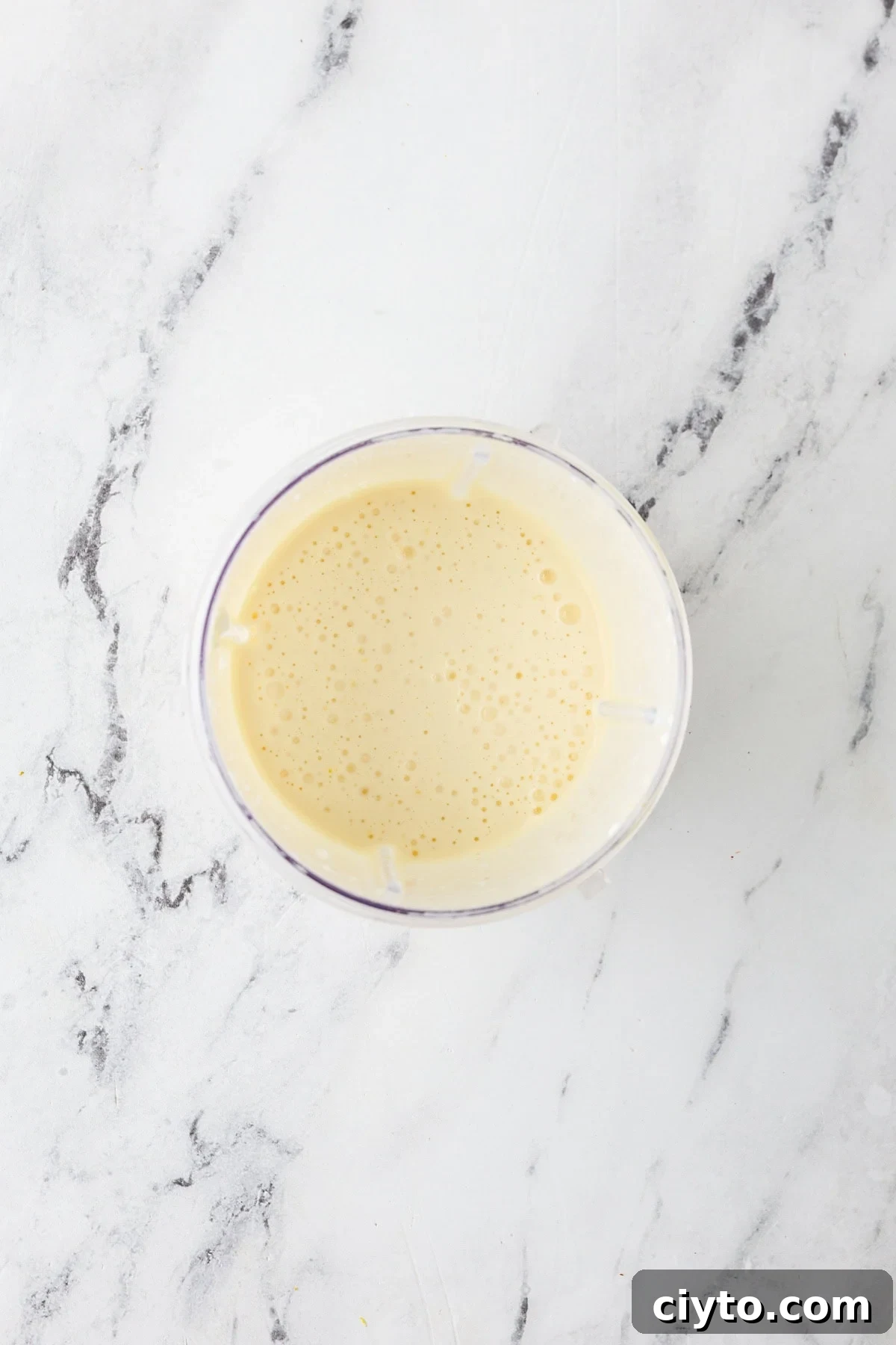 An overhead image of blending the wet ingredients together.