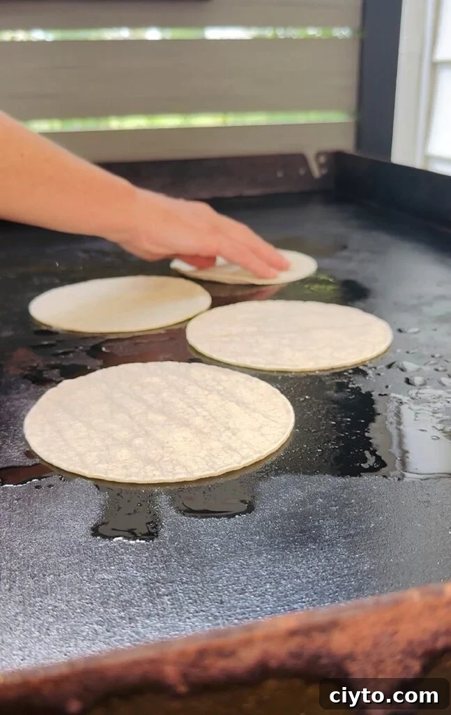 Blackstone Griddle Sushi Tostadas Recipe 5 tortillas on griddle