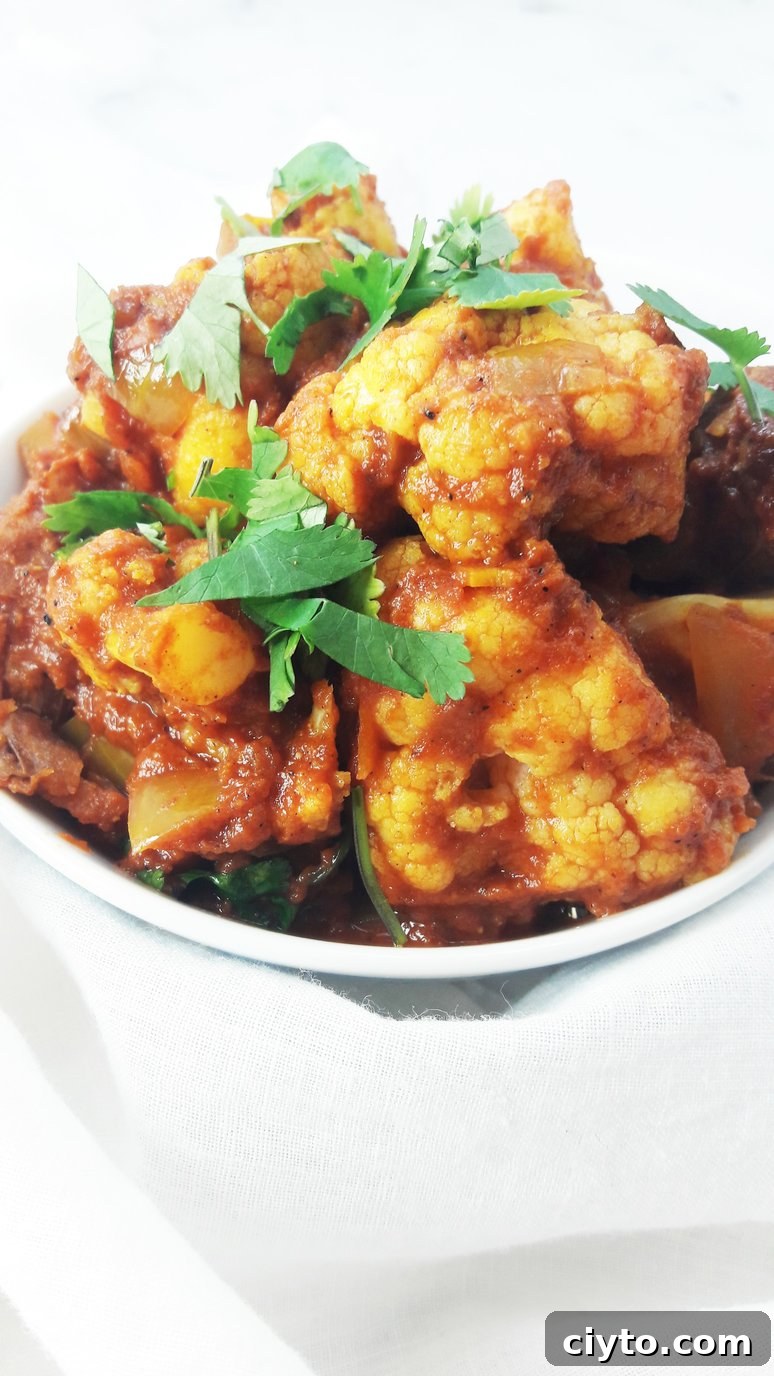 Potato and cauliflower aloo gobi close-up.
