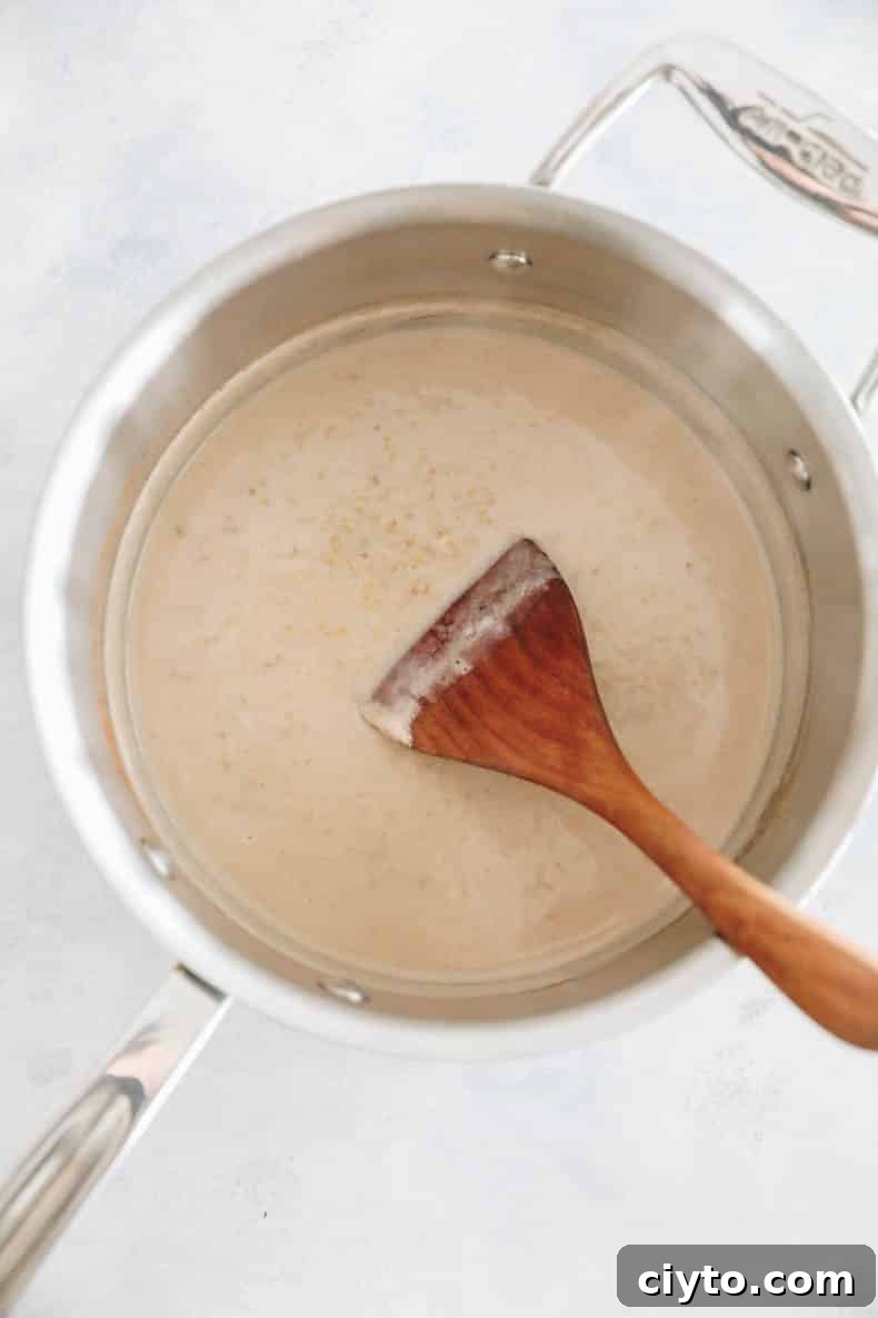 steel cut oats cooking in a saucepan