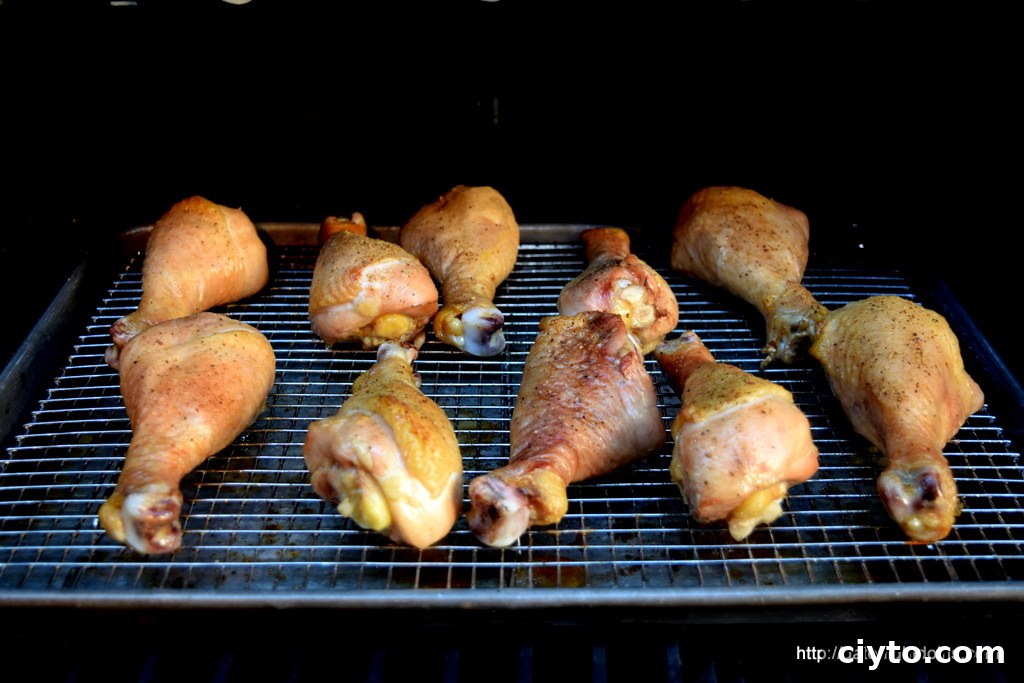 Chicken drumsticks on a rack