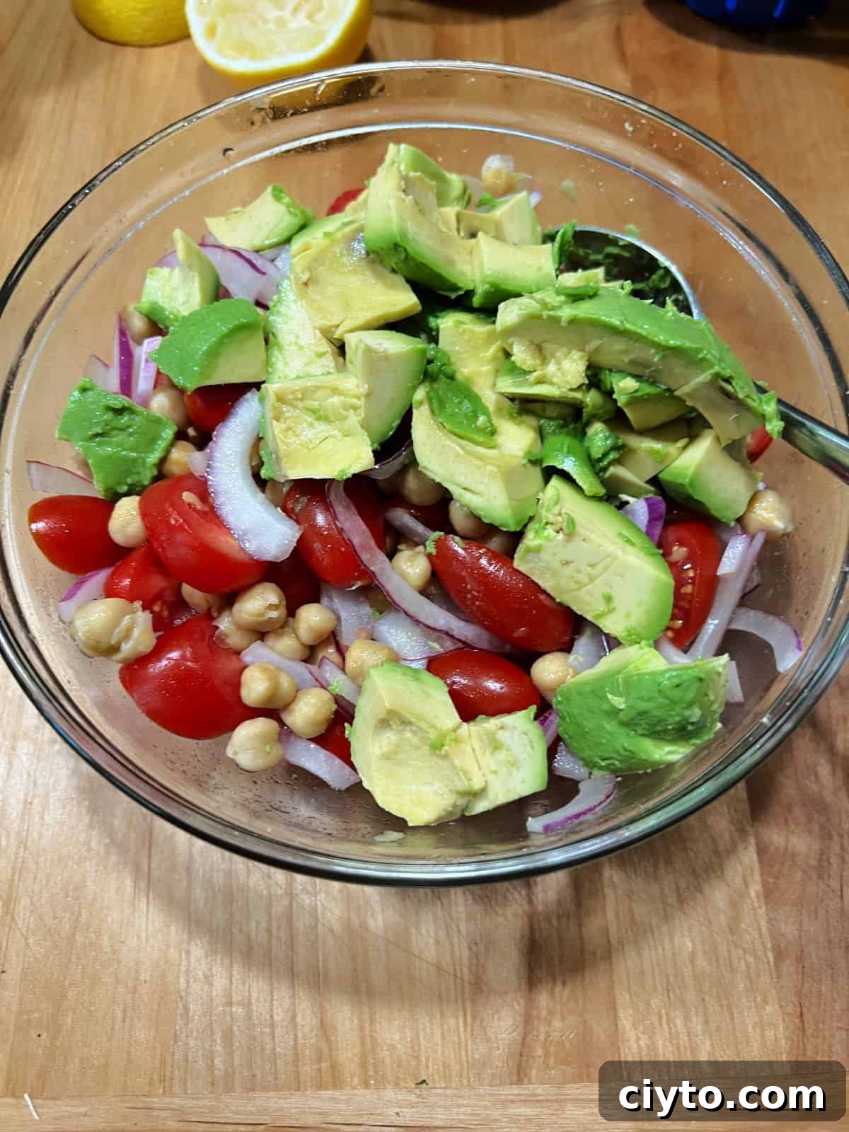 Chickpea and Avocado Salad Recipe 6 Diced avocado added to the bowl.