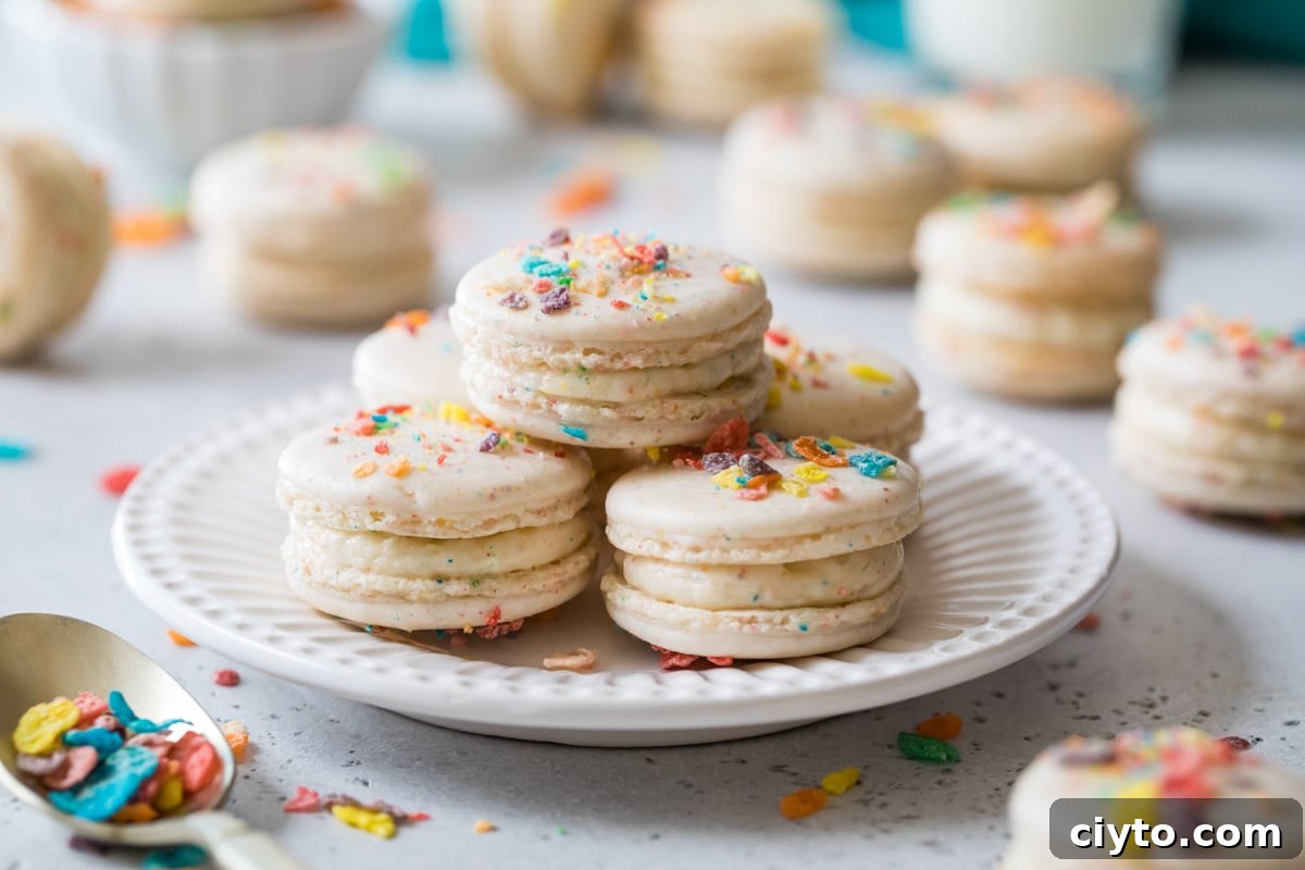 Plate of fruity pebbles macarons.