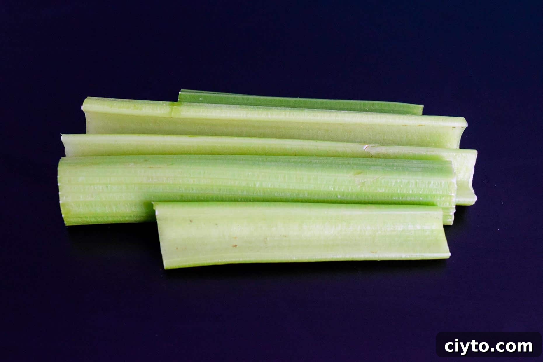Celery on black background