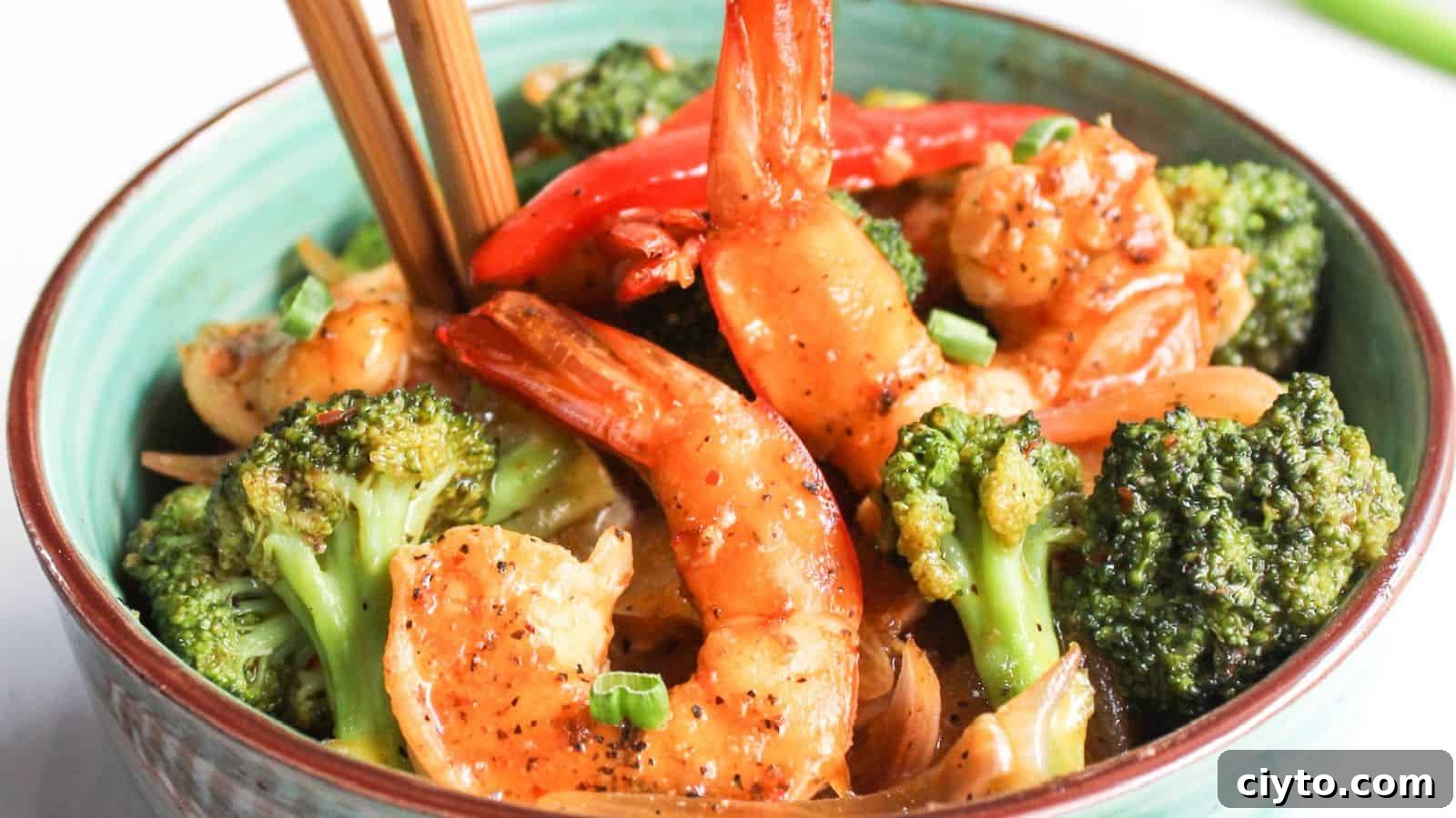 Shrimp and broccoli stir-fry in a bowl.