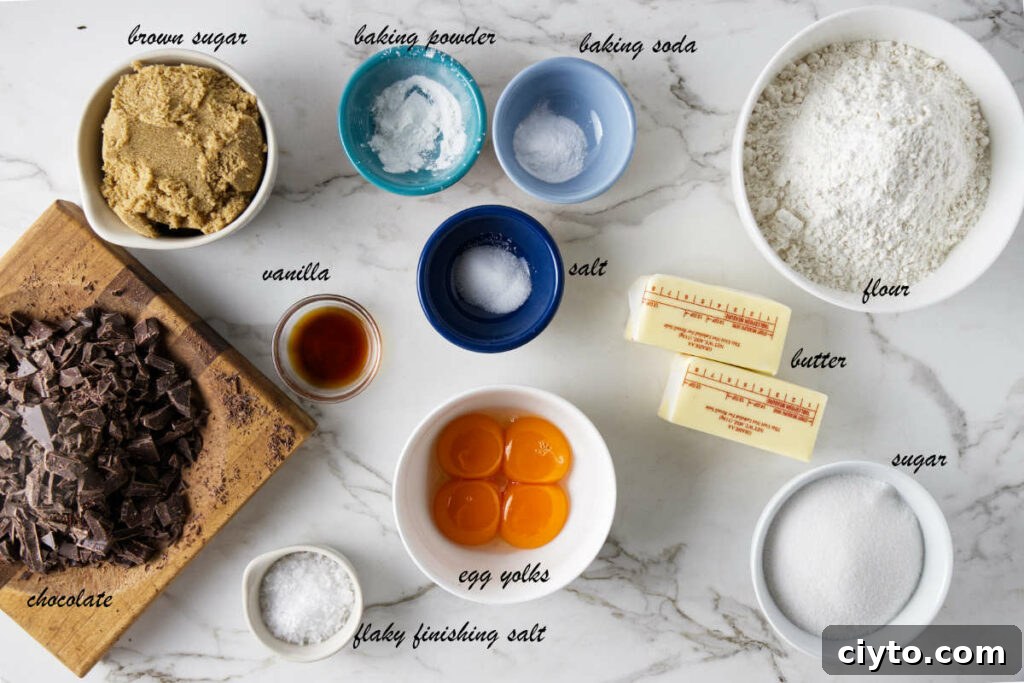 Egg Yolk Cookies Recipe: Crispy, Buttery Treats 4 Brown sugar, baking powder, baking soda, salt, flour, butter, sugar, egg yolks, vanilla, and chopped chocolate.