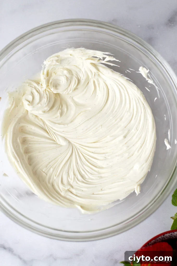 whipped mascarpone in a glass bowl