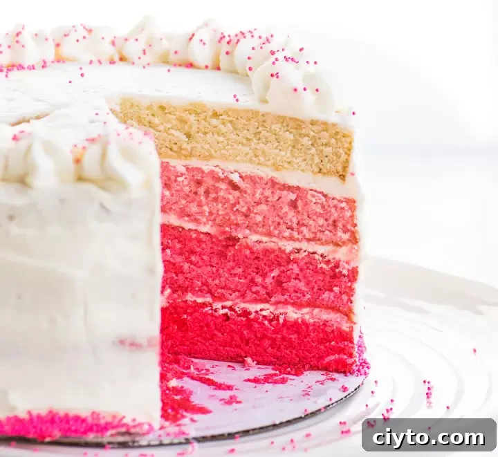 Pink Ombre Cake Recipe: Step-by-Step for Gorgeous Layers 2 sliced pink ombré cake on a cake stand
