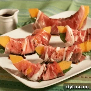 Melon wrapped in prosciutto with basil