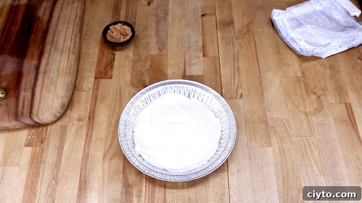 cream cheese in a foil pie tin