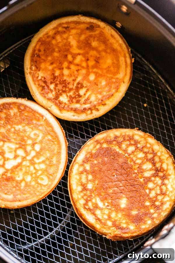 Yes you can make Air Fryer frozen pancakes and within 6 minutes you have soft, moist, fluffy and warm pancakes. The Air Fryer is perfect to cook your frozen pancakes. Get them warmth through and serve them for breakfast or lunch.