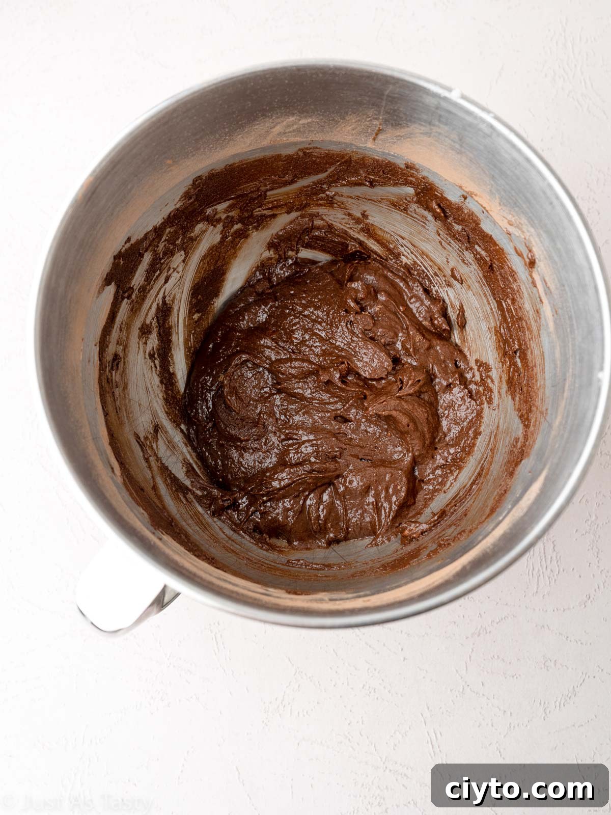 Chocolate cupcake batter in a bowl.