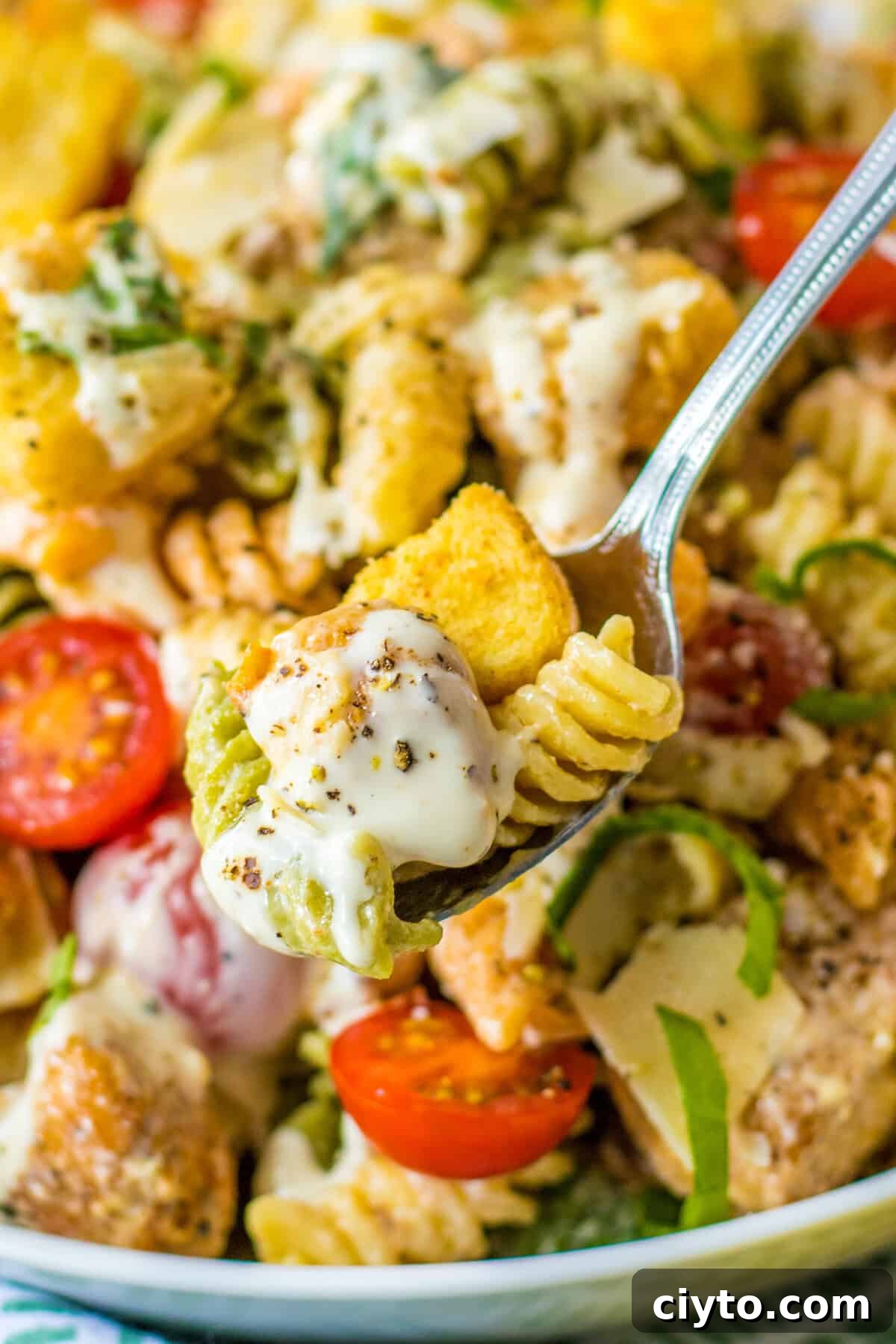 Chicken Caesar Pasta Salad Recipe with Crispy Croutons 8 Forkful of Chicken Caesar Pasta Salad.