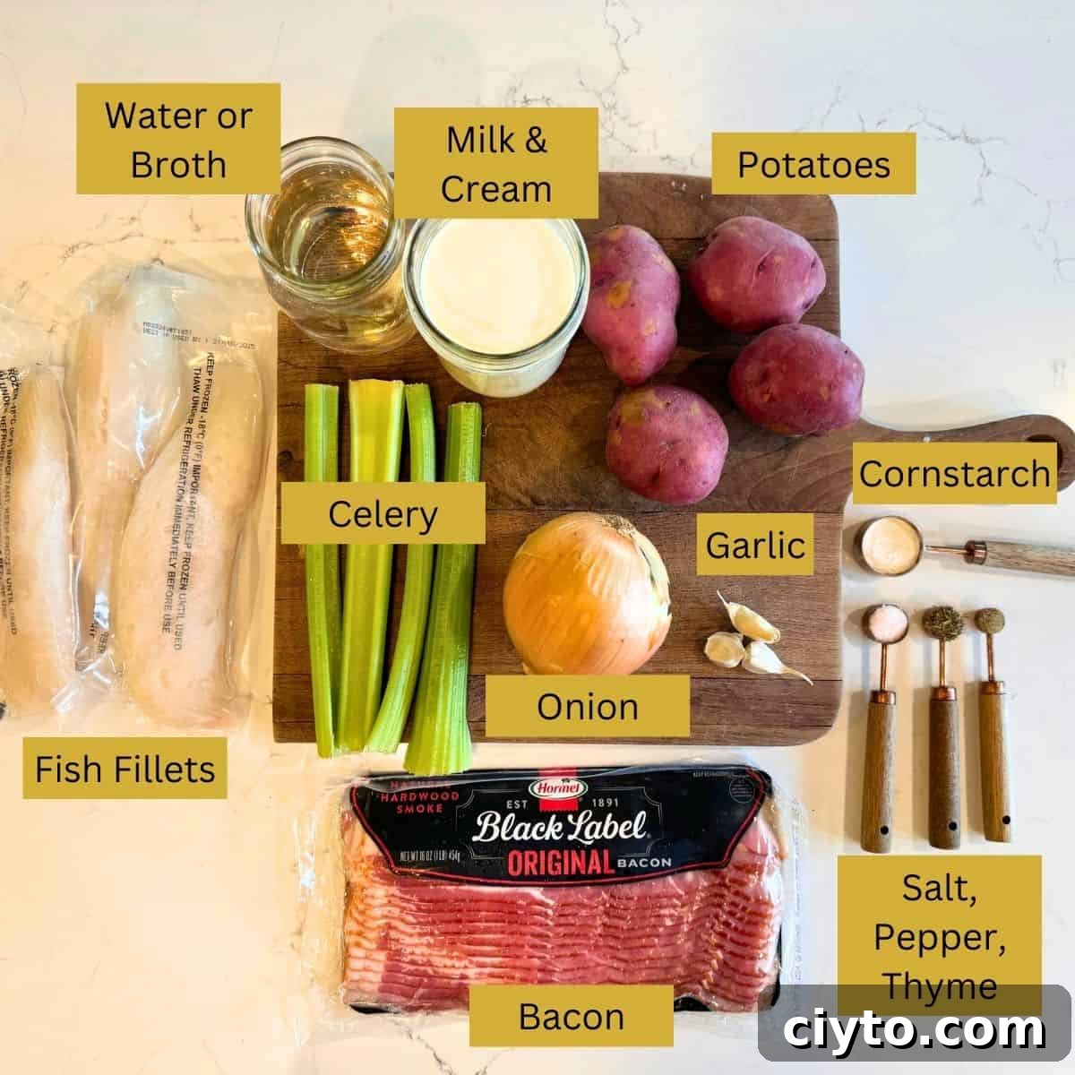 ingredients for creamy fish chowder fish fillets, broth or water, cream and milk, potatoes, onion, garlic, celery, bacon, cornstarch, salt, pepper and thyme