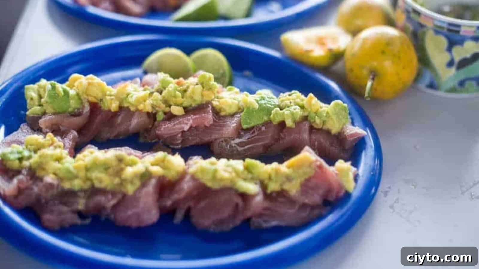 19 Crowd-Pleasing Appetizer Recipes Guests Can't Resist 19 Tuna carpaccio topped with avocado and bright passion fruit.