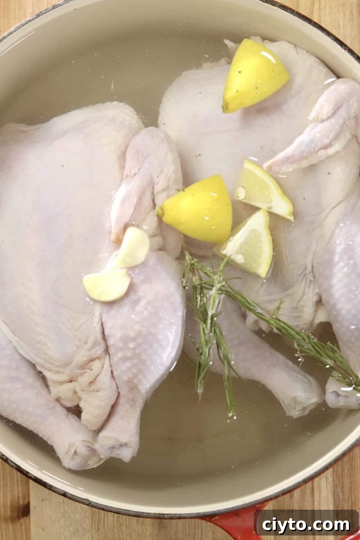 Chicken brine for meal prep chickens in brine with lemons and herbs