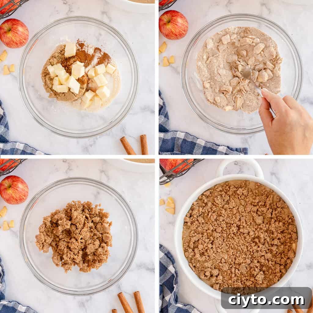Cake batter in a baking dish is topped with streusel.