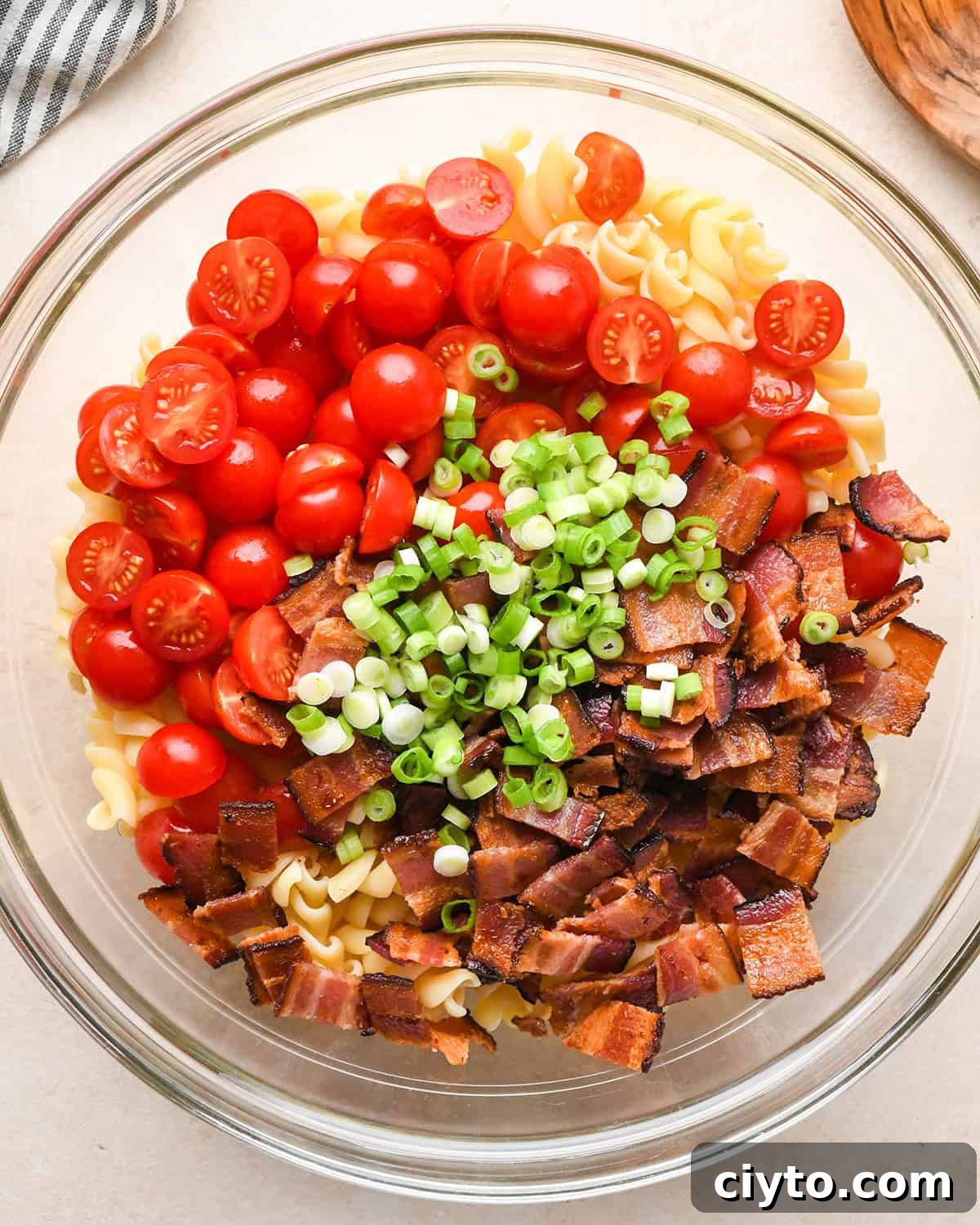 BLT Pasta Salad Recipe with Bacon, Tomato and Lettuce 13 ingredients in a bowl before stirring