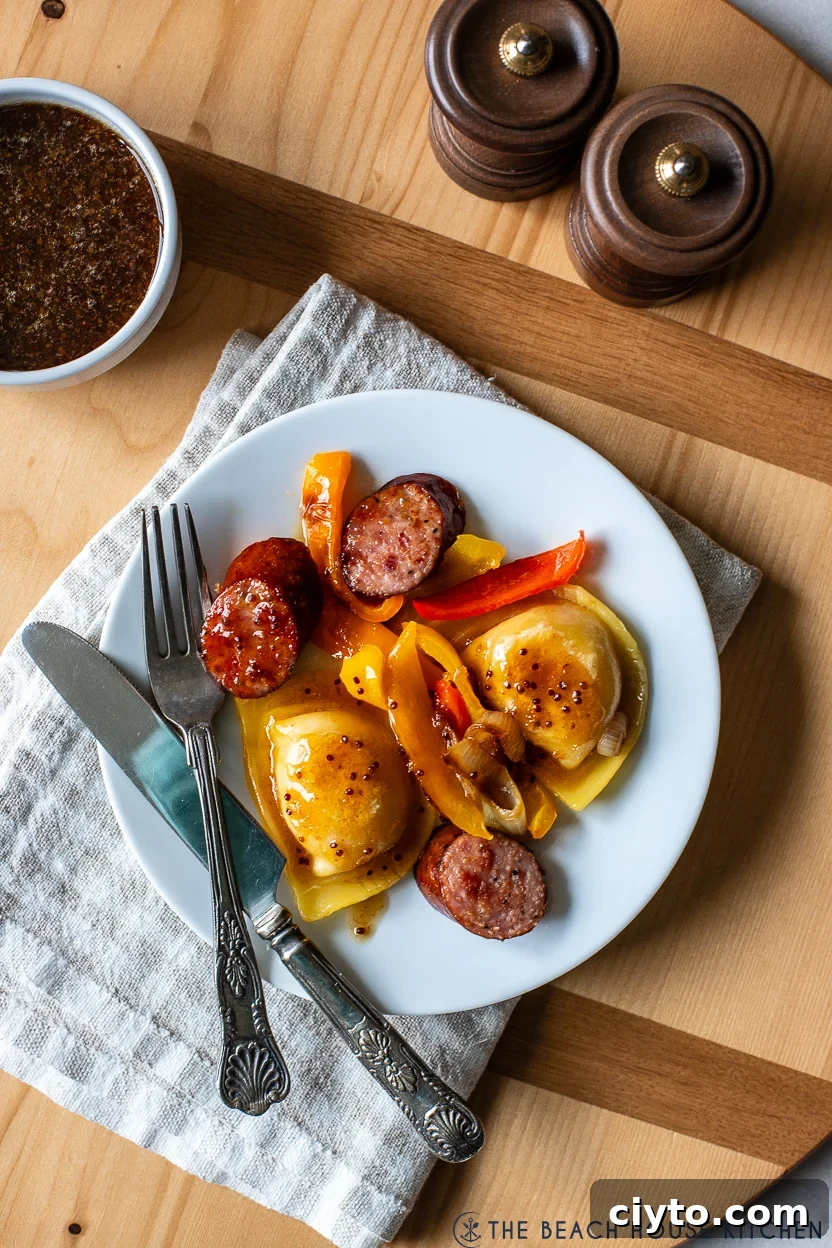 Plate of Pierogies with Kielbasa, Peppers and Onions